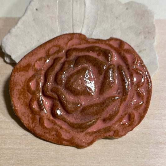 embossed flower brooch