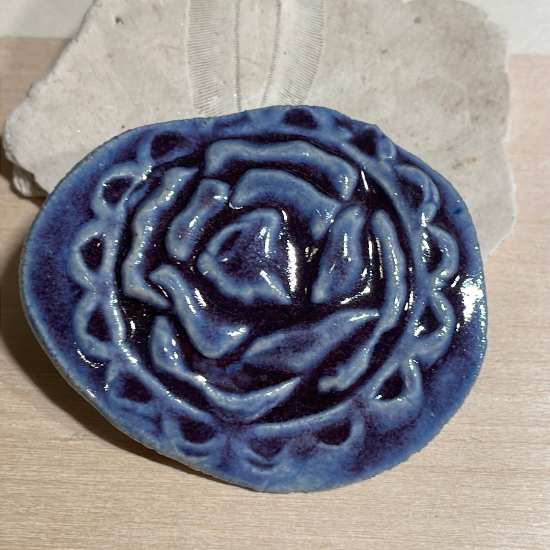 embossed flower brooch