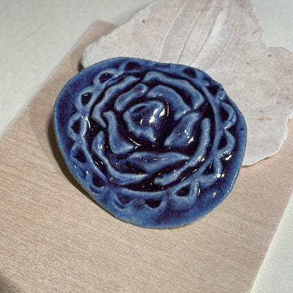 embossed flower brooch