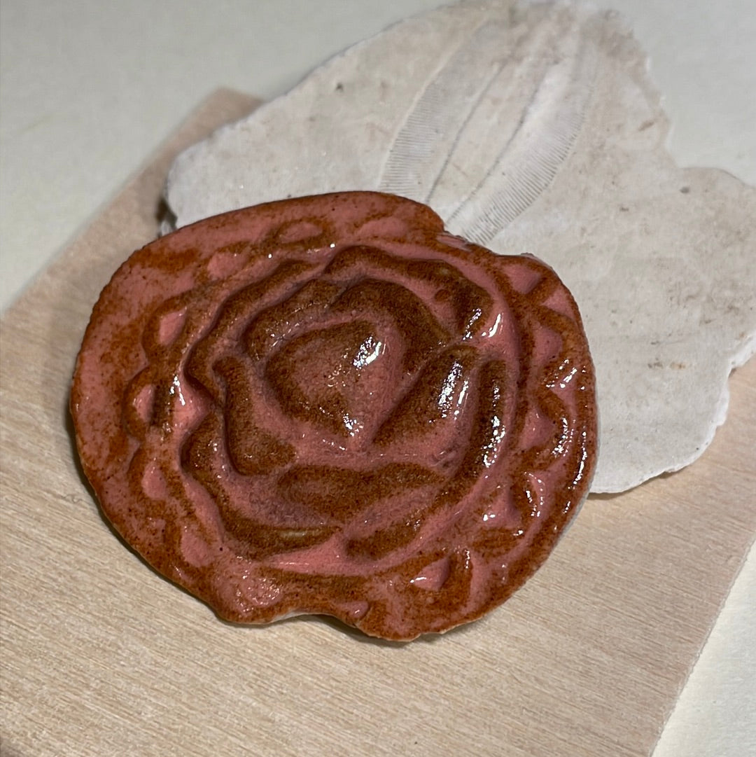 embossed flower brooch