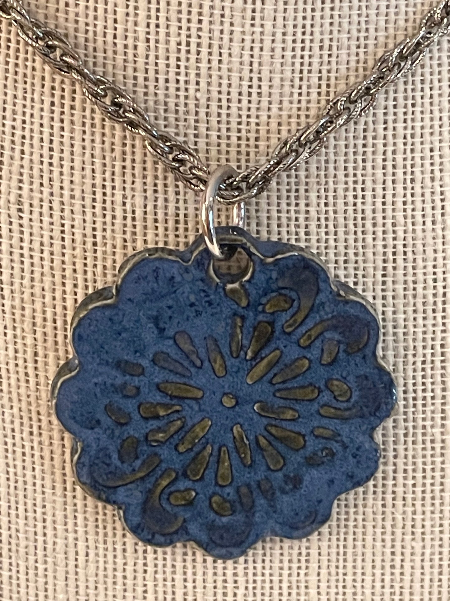 embossed medallion necklace